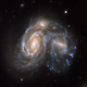 Illustration for article titled The Cosmic Wonder of Colliding Galaxies